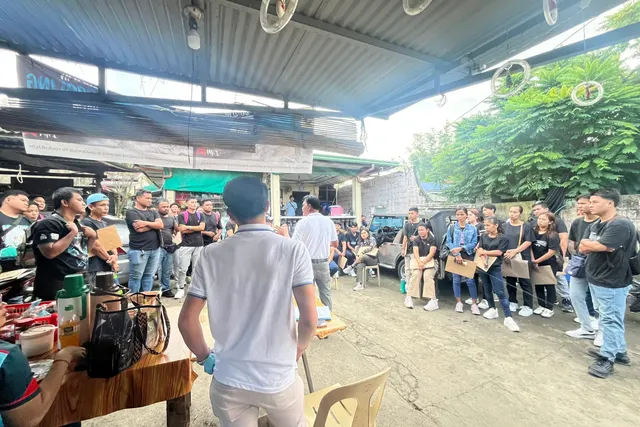Kariken personnel gathered for an employee meeting